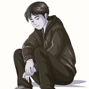 Sad teenage sitting on the floor